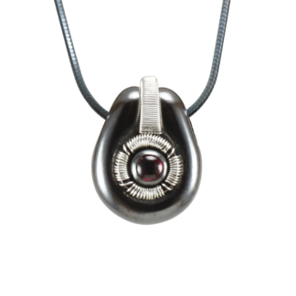 Small Jack Boglioli pendant from the Boldly Unique Collection with patina and garnet