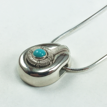 Small Jack Boglioli pendant from the Boldly Unique Collection with turquoise