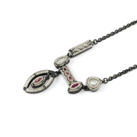 Angle shot of Jack Boglioli Art Jewelry Necklace Love in Motion Sterling and Fine Silver
