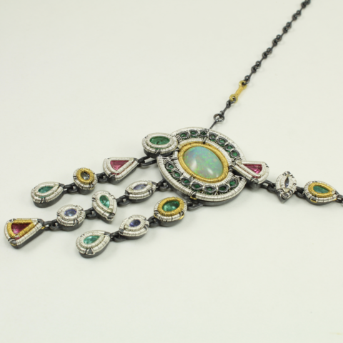 Angle shot of Jack Boglioli art jewelry necklace made for Artsthrive 2018 at the Albuquerque Museum