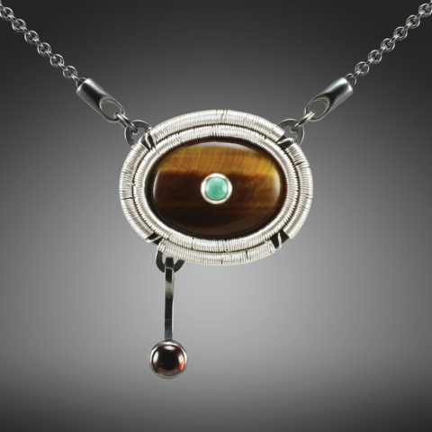 Jack Boglioli art jewelry necklace made with tigers eye, turquoise and garnet.
