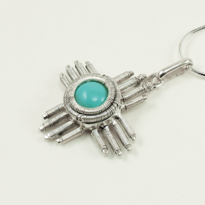 Medium Jack Boglioli zia pendant from the New Mexico Collection with turquoise