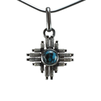 Small Jack Boglioli Zia pendant from the New Mexico Collection with turquoise and patina