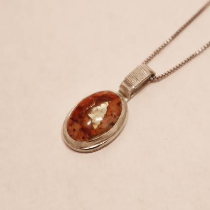Angleshot of Mexican opal pendant